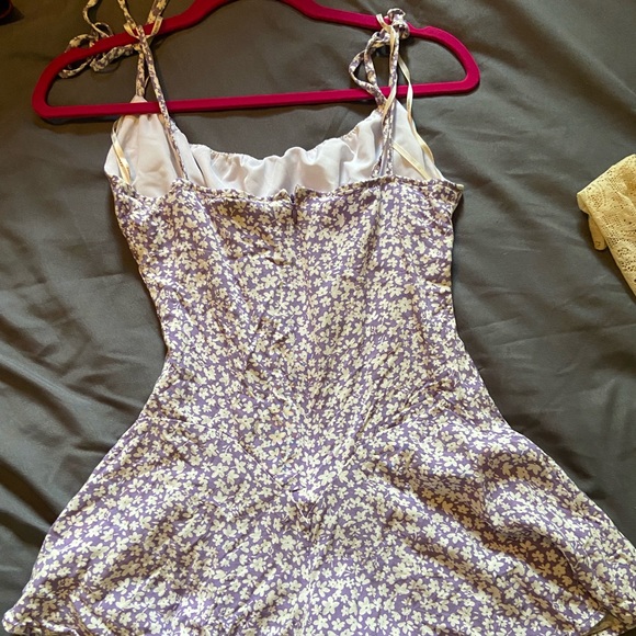 Lilac romper with white flowers, ruffle bottom - Picture 2 of 3